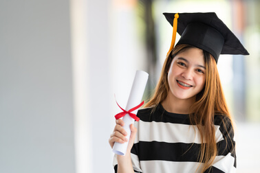 Happy graduate celebrating academic achievements